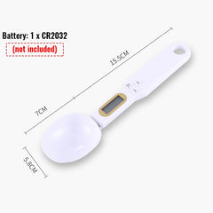 White electronic measuring spoon with digital display and measurements on a white background