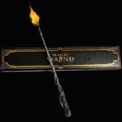 Magic wand with flame and packaging on a black background