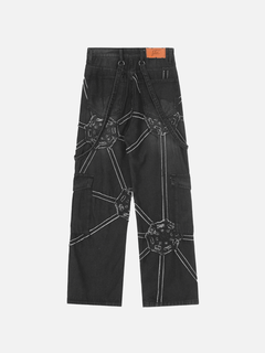 Black pants with geometric patterns on a white background