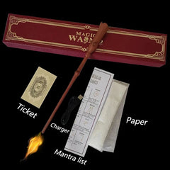 Magic wand with packaging, ticket, charger, and paper on a black background