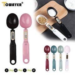 Set of digital measuring spoons in various colors with a cutting board and ingredients in the background.