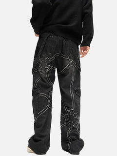 Black cargo pants with white stitching on a white background
