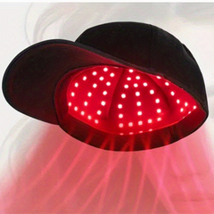 Red light therapy device with glowing red LEDs on a white background
