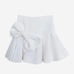 White skirt with a large bow on a white background