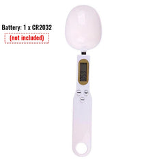 Digital measuring spoon with a battery indicator on a white background