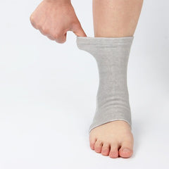 "Sports ankle support socks worn during workout, showing secure fit and ankle protection"