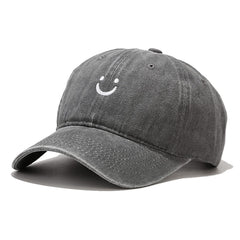 Green cap with a black logo on a light gray background