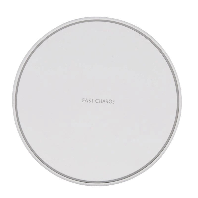 Round wireless charging pad with 'Fast Charge' text on a white background