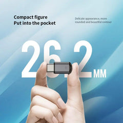 Small USB device held between fingers with text about its compact size on a blue gradient background